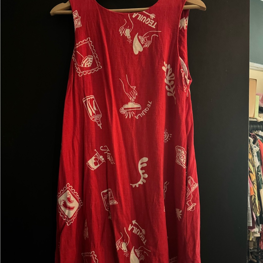 Red Sleeveless Dress with White Patterns